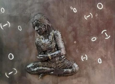 Bas-relief of Brahmagupta as seen in Shaheedi Park, Delhi. The sculpture has been constructed using waste material.