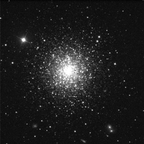 Lots of stars against a black background. Each star is a white dot of varying sizes. Though some are scattered around the edges of the image, most are concentrated in the centre which glows brightly as a result.