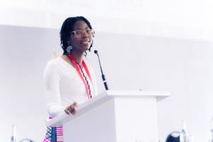 Picture of Joyful Mhdluli giving a talk 